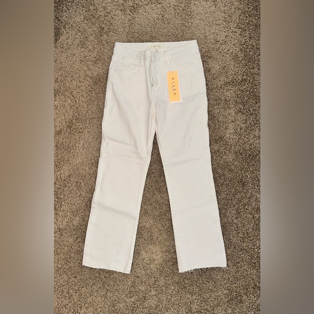 Risen jeans, new with tags. Size 7/28.